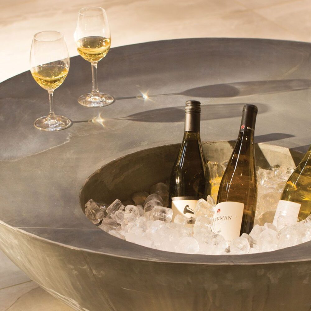 This Modern Outdoor Table Also Stores Your Drinks