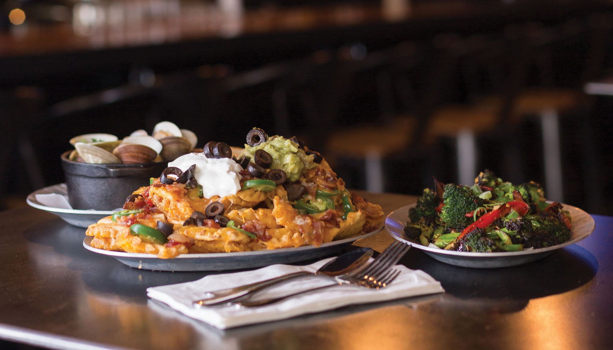 Nachos and Waffle Fries Join Forces for a Wildly Addictive Bar Snack