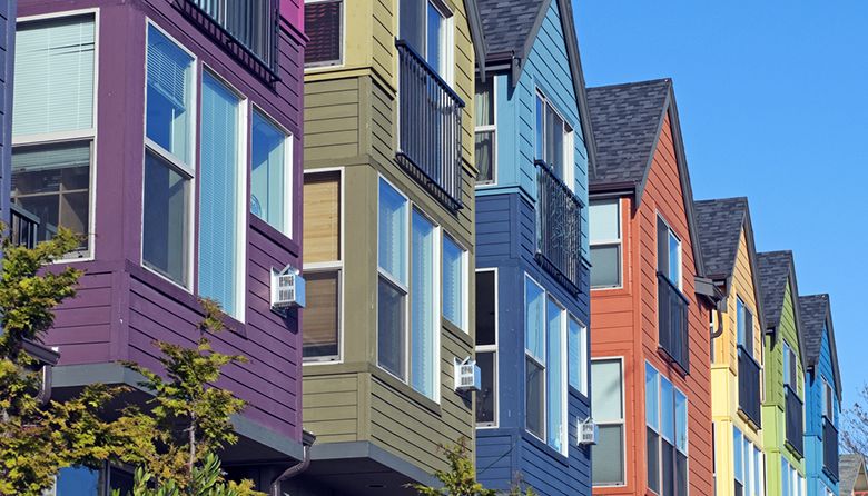 Row of new houses painted various colors in Seattle's Wallingford neighborhood