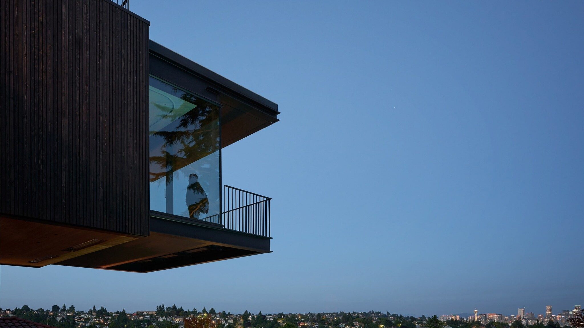 The house offers expansive views across Puget Sound and to downtown Seattle.