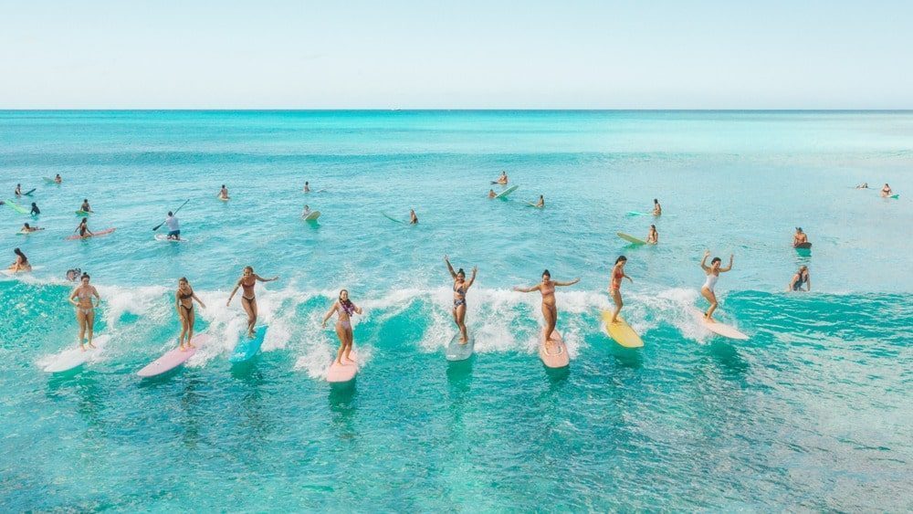 Take surf lessons at the Kaimana Beach Surf Shop.