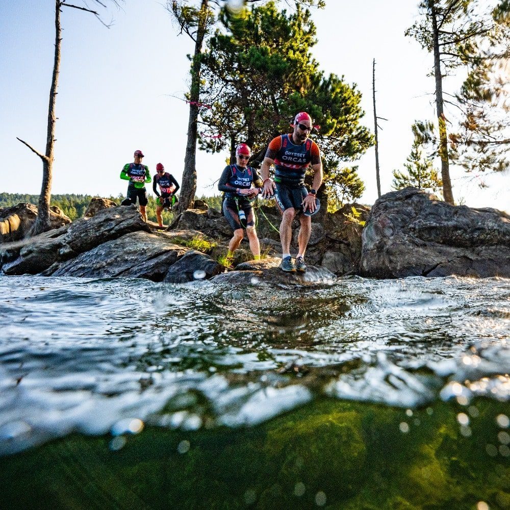 Running in a Wetsuit, Swimming in Shoes