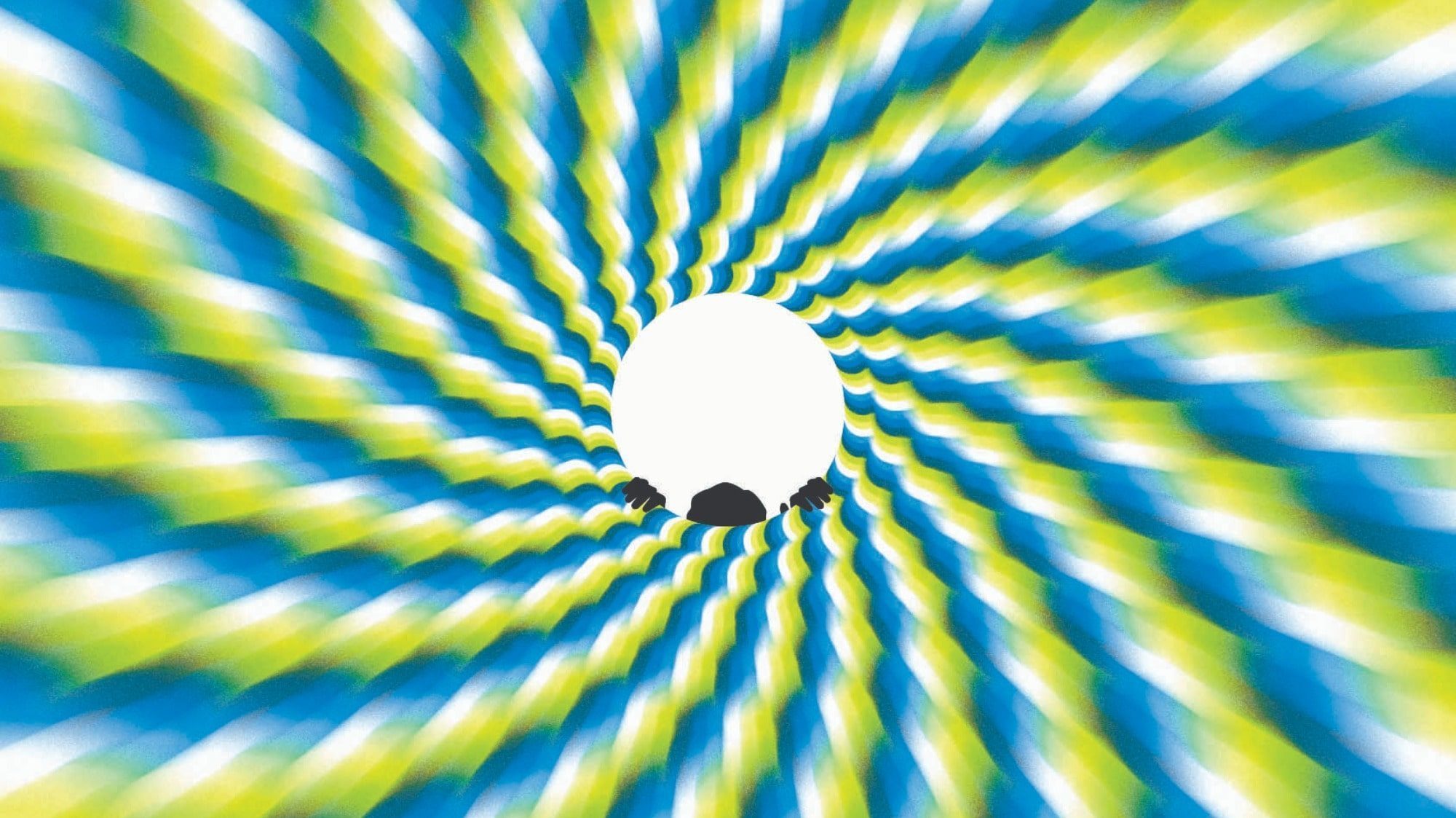 A circular optical illusion with a white center, surrounded by spiraling blue, green, and yellow patterns, creating a psychedelic sense of motion. Black silhouettes are present at the bottom of the image.
